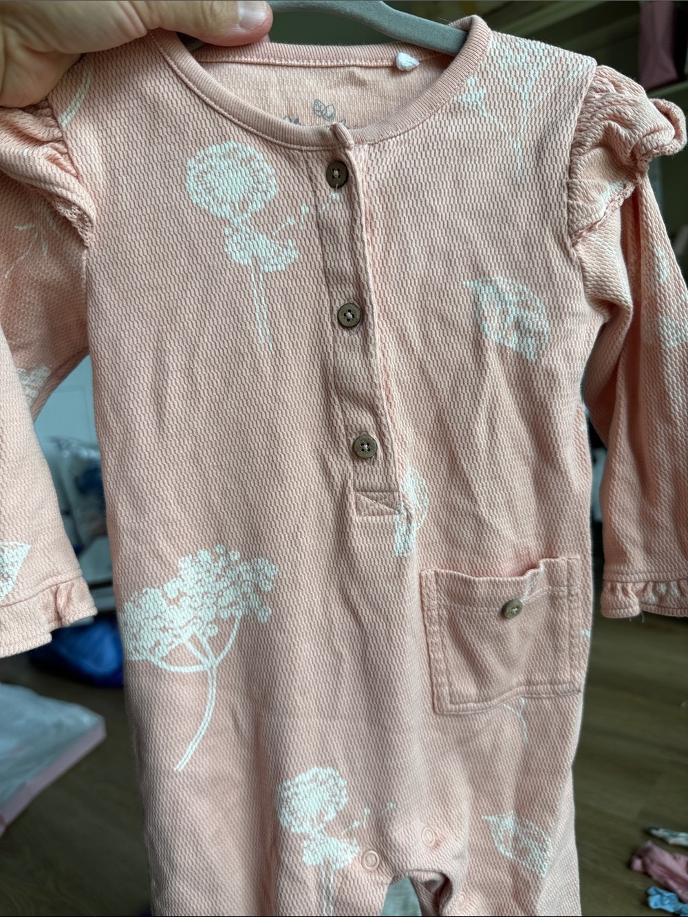 Infant pink Floral Button-Front Romper. 100% organic cotton